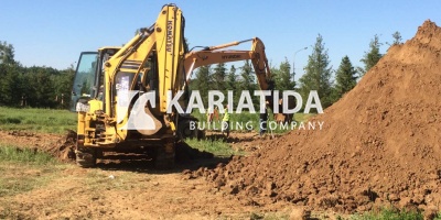 Разработка грунта котлована, подготовка площадки под строительство загородного дома.